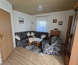 Ferienhaus in K&uuml;hlungsborn - H&ouml;ppner, Joachim - Wohnbereich mit gem&uuml;tlichem Ecksofa