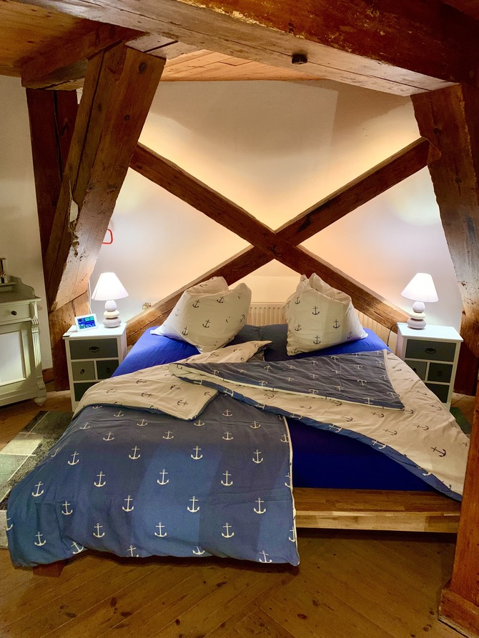 Ferienhaus in Lindau - Windm&uuml;hle Lindaum&uuml;hlenholz - Gro&szlig;es Doppelbett auf dem Mahlboden