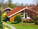 Ferienhaus in Pelzerhaken - Am Waldrand Haus C - Außenansicht mit Terrasse