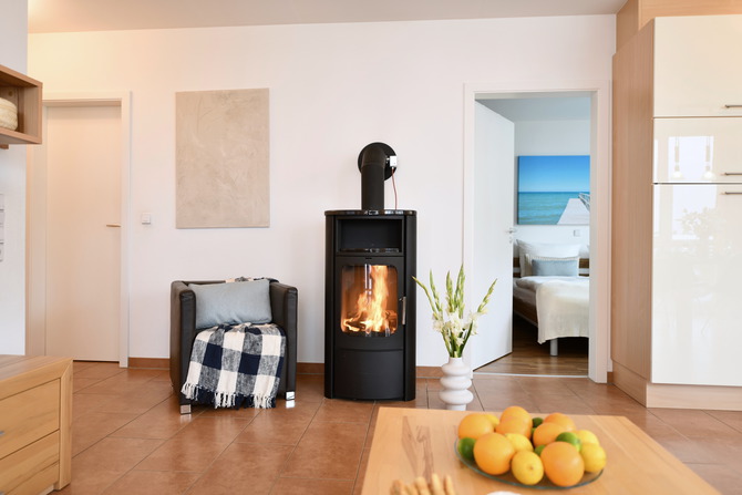Ferienwohnung in Gro&szlig;enbrode - Seed&uuml;ne 4 - Kaminofen